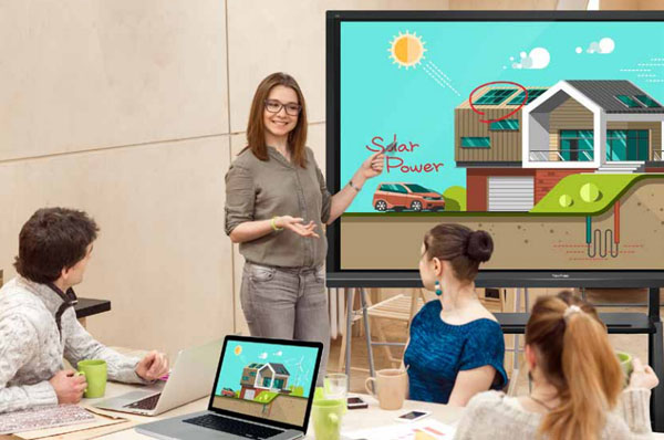 Teacher and Students Using Touchscreen