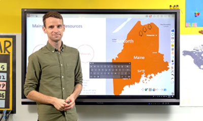 Teacher at Interactive Touchscreen